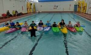 a-picture-containing-indoor-swimming-water-sport A picture containing indoor, swimming, water sport, sport Description automatically generated