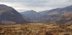 A picture containing mountain, grass, outdoor, sky Description automatically generated