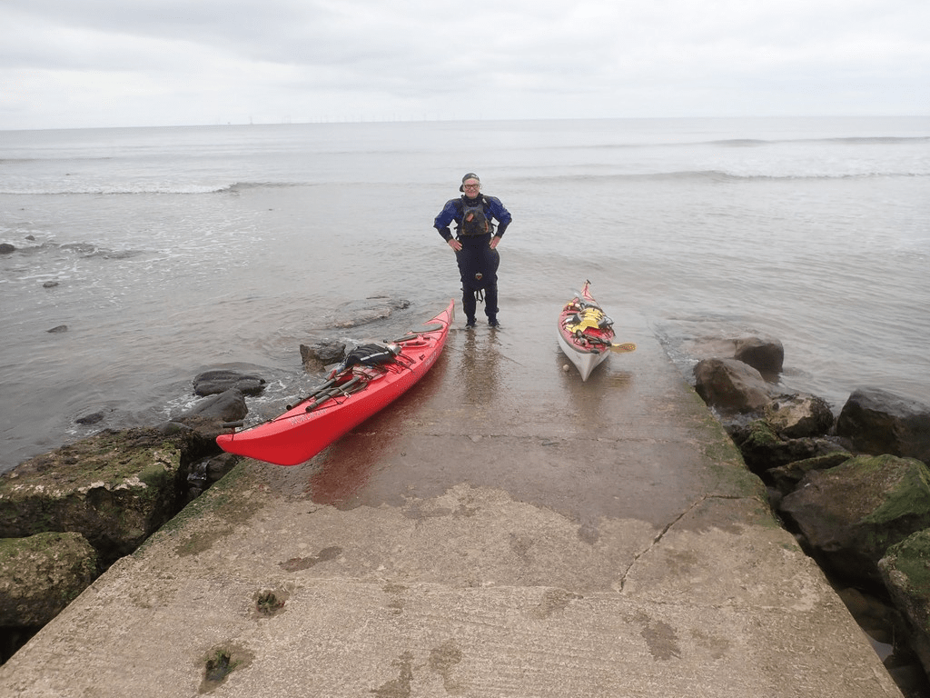 A picture containing water, beach, outdoor, sky

Description automatically generated