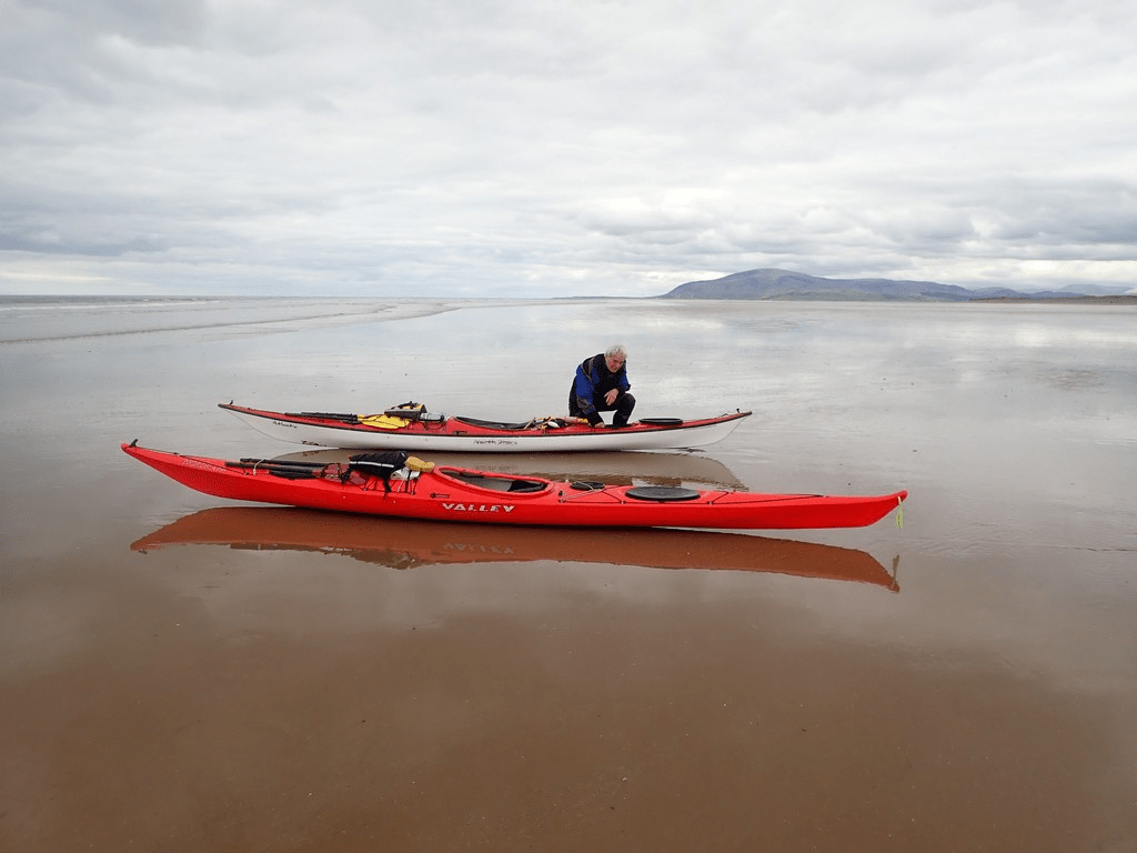 A picture containing water, outdoor, red, boat

Description automatically generated