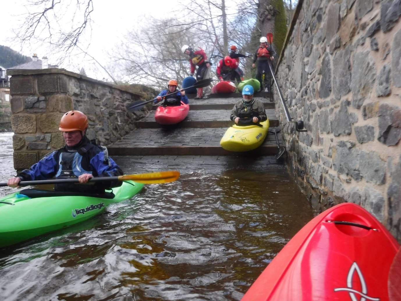 May be an image of 4 people, people sitting, body of water and nature