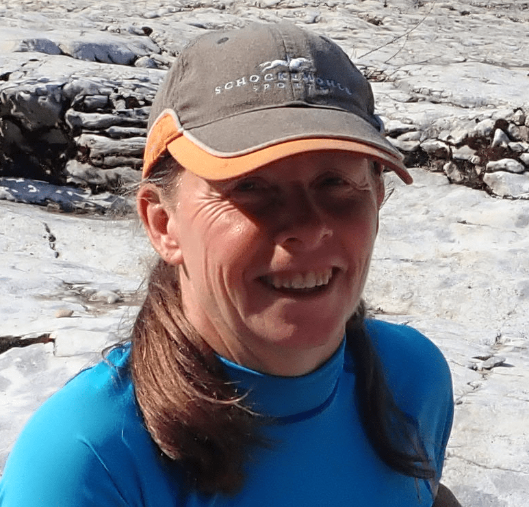 A person wearing a hat and blue shirtDescription automatically generated with low confidence