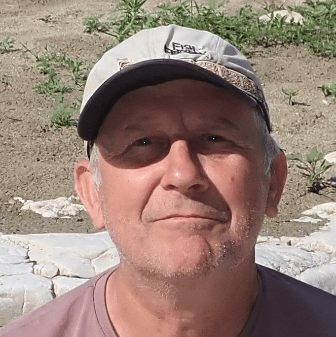 A person wearing a hatDescription automatically generated with medium confidence