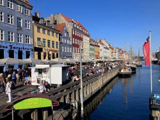 A picture containing outdoor, sky, building, waterDescription automatically generated