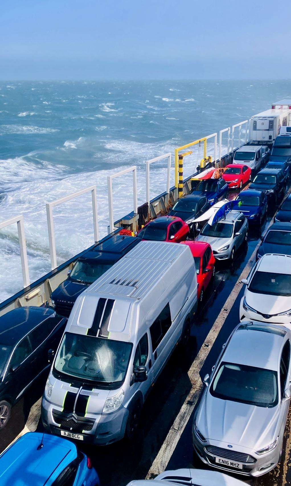 A truck on a ferryDescription automatically generated