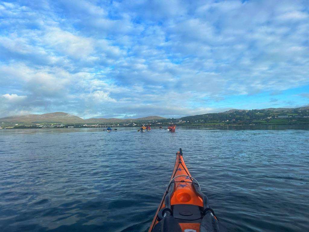 A kayak in the waterDescription automatically generated