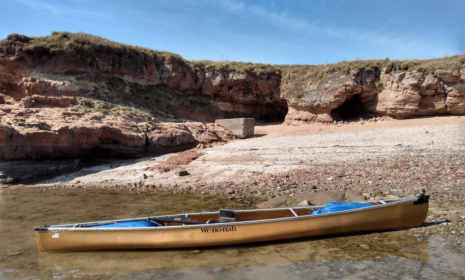A canoe on a riverDescription automatically generated