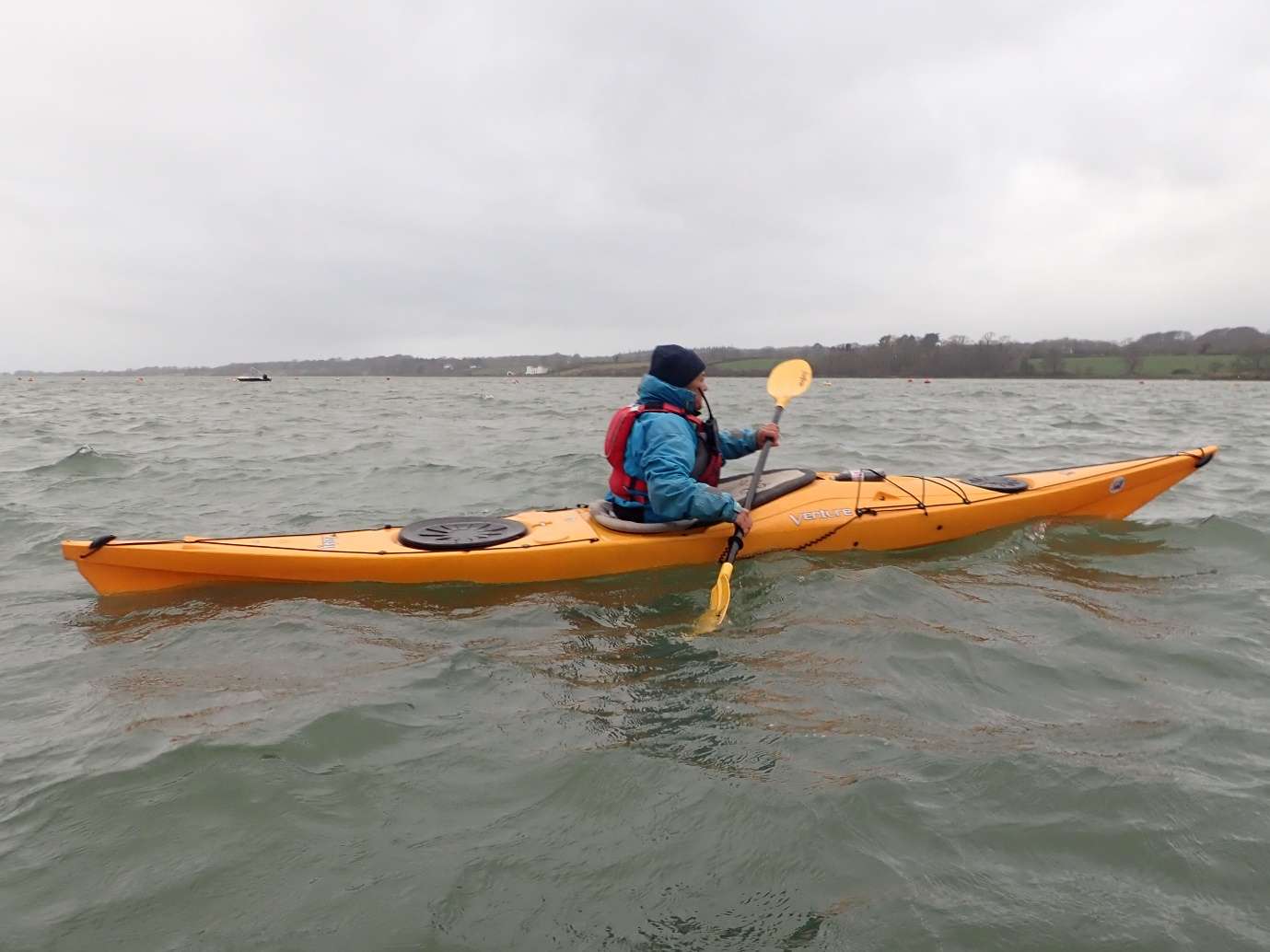 A person in a kayakDescription automatically generated