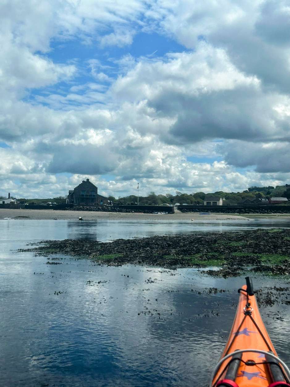 A kayak on the waterDescription automatically generated
