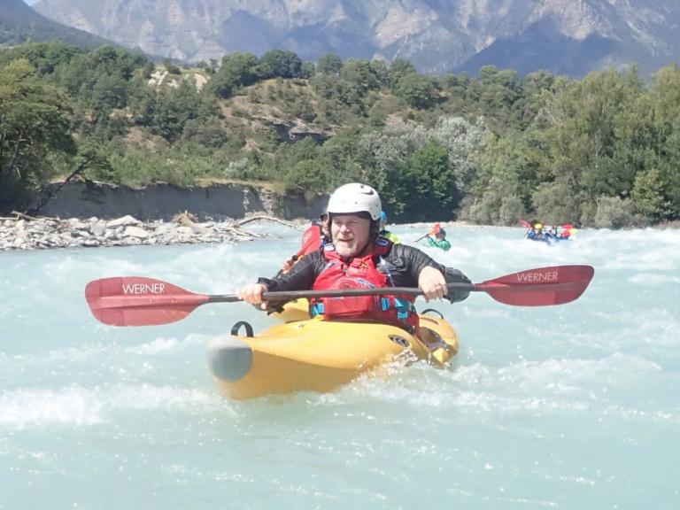 A person in a kayak Description automatically generated