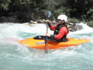 A person in a kayak Description automatically generated