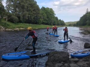 SUPs on River Dee