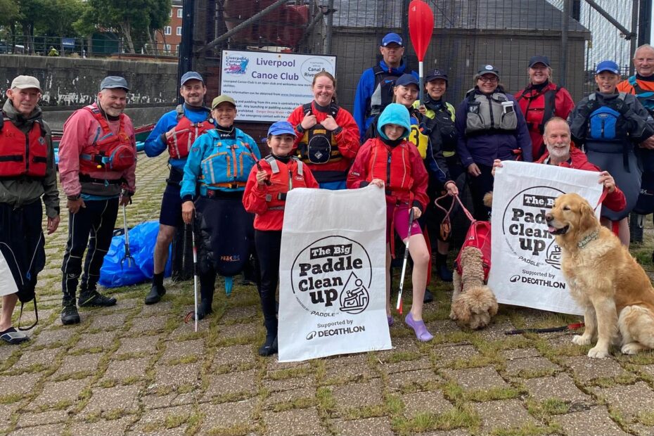 A group of people holding signs AI-generated content may be incorrect.