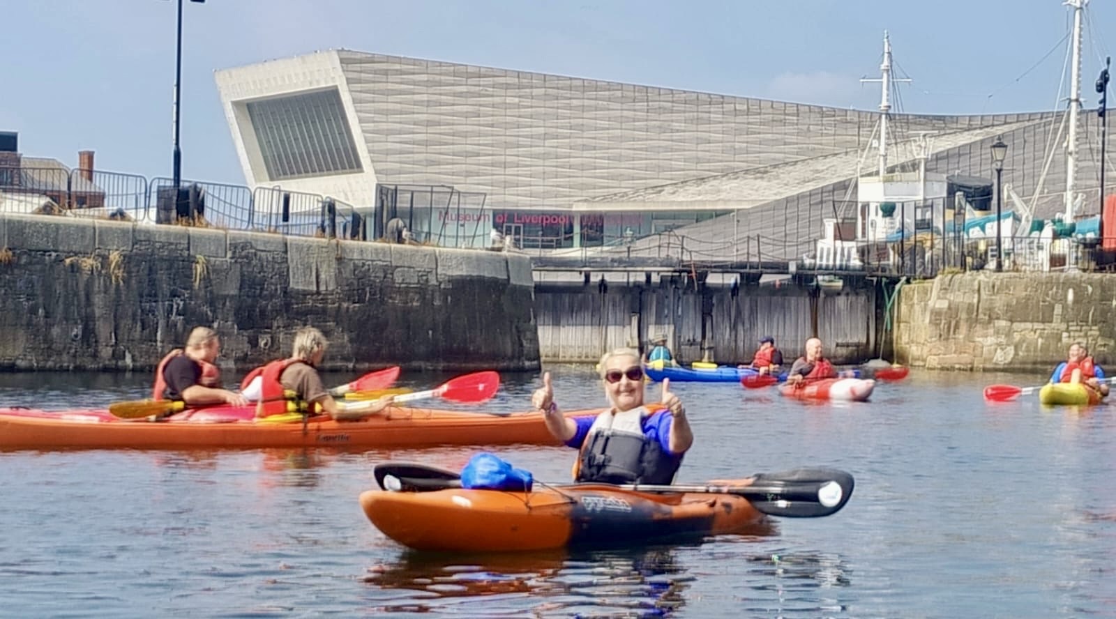 A person in a kayakAI-generated content may be incorrect.