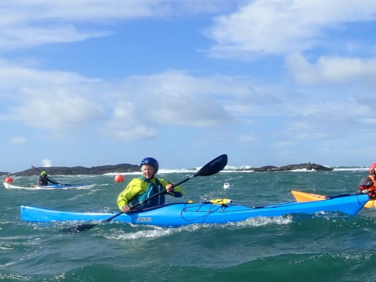 Sally Parker - surfing at Trearddur Bay