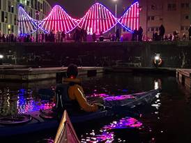 A person in a kayak on a river AI-generated content may be incorrect.