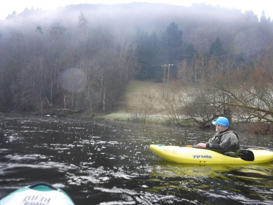 A person in a kayak in a river

Description automatically generated with medium confidence
